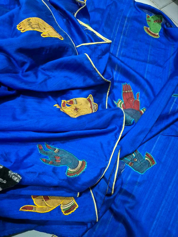 Vibrant Blue Saree with Hand Motifs