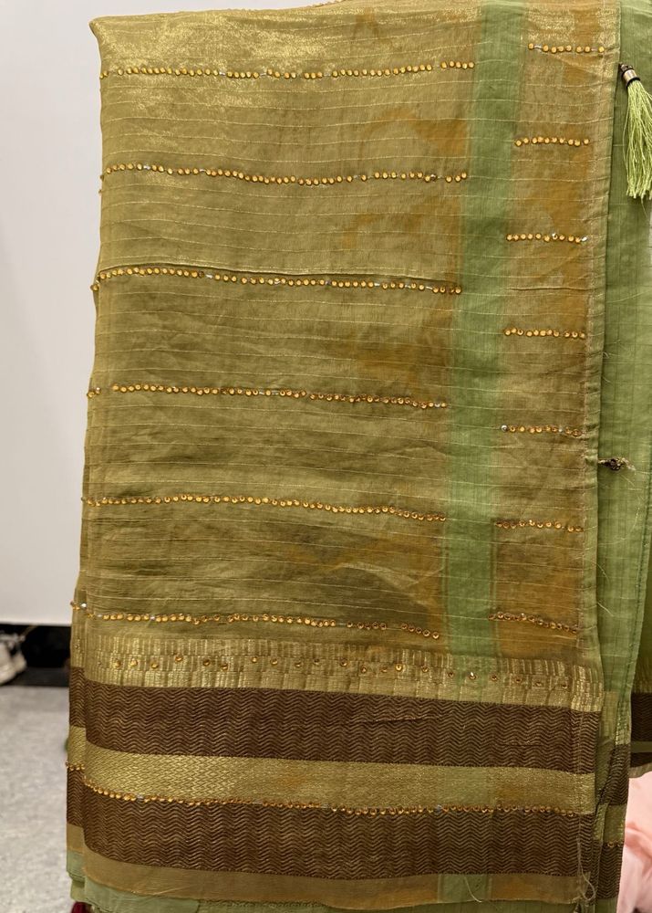 Elegant Green Saree with Embellishments