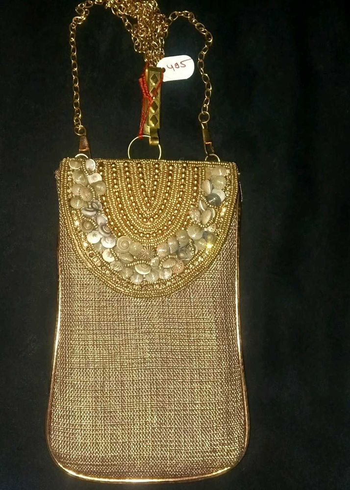 Elegant Golden Beaded Clutch