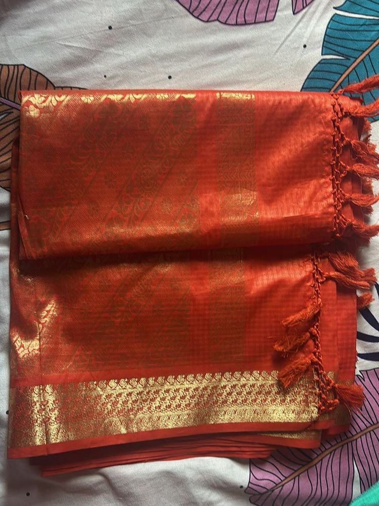 Orange Silk Saree with Gold Border