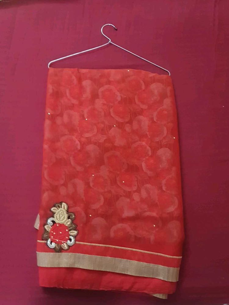 Beautiful Red Saree with Floral Design