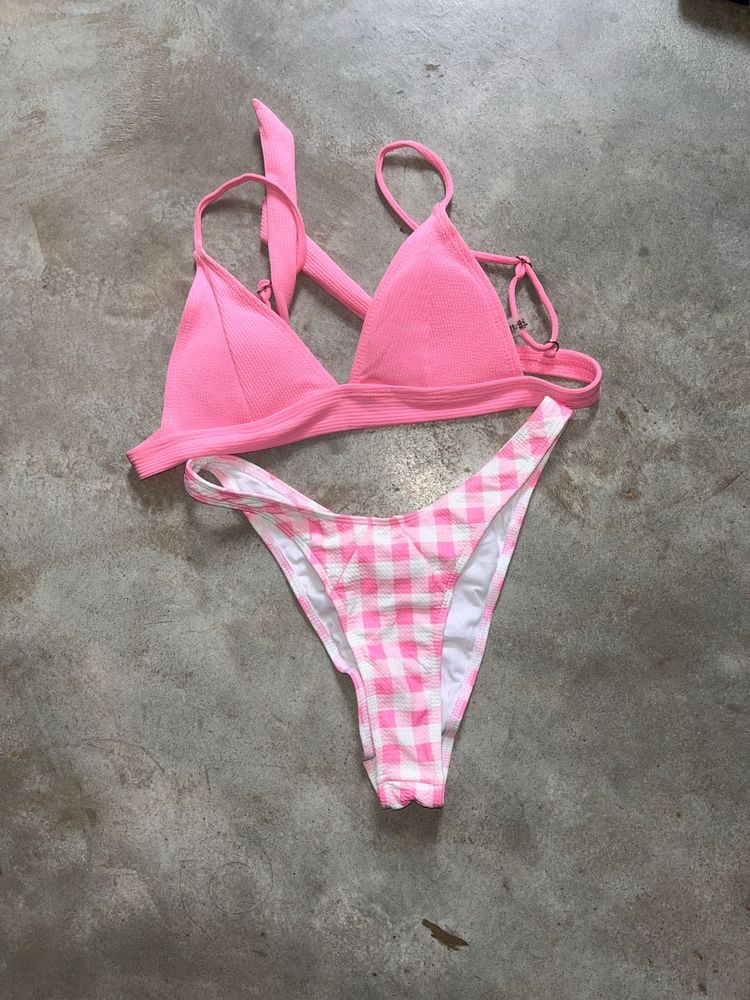 tri-bralette style bikini top and pink bot