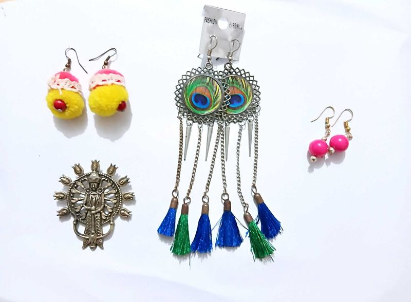 earrings set with a pendent