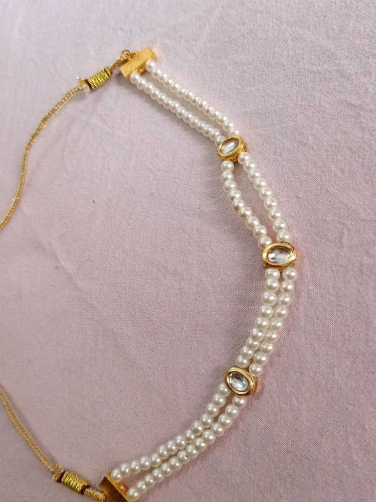 Elegant Pearl Necklace with Stone Accents