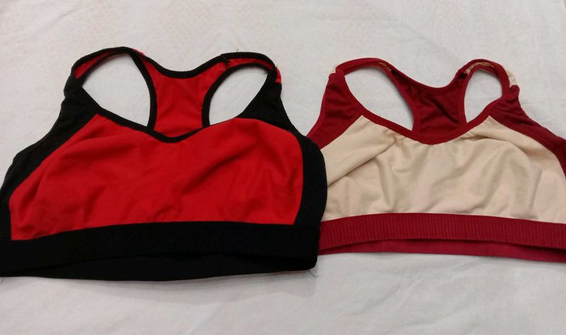 2 Racerback Sports Bras + brown handbag.