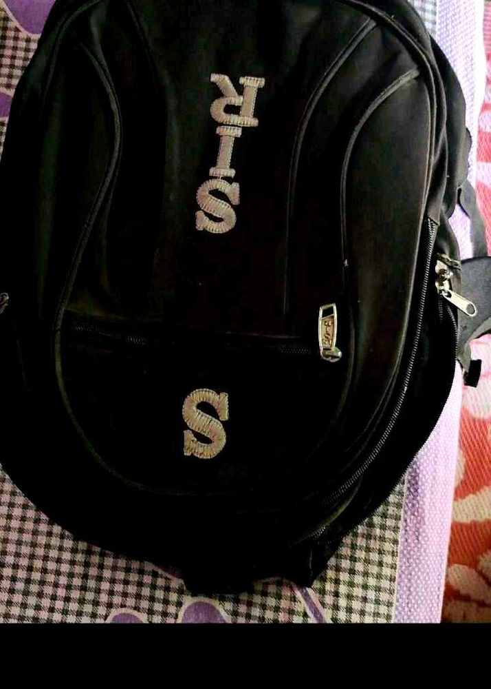 Black Backpack with "SIR S" Logo