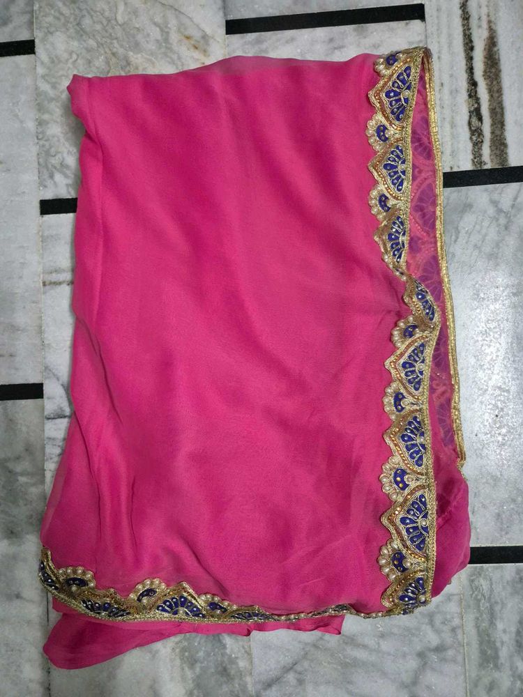 pink saree with blue lace