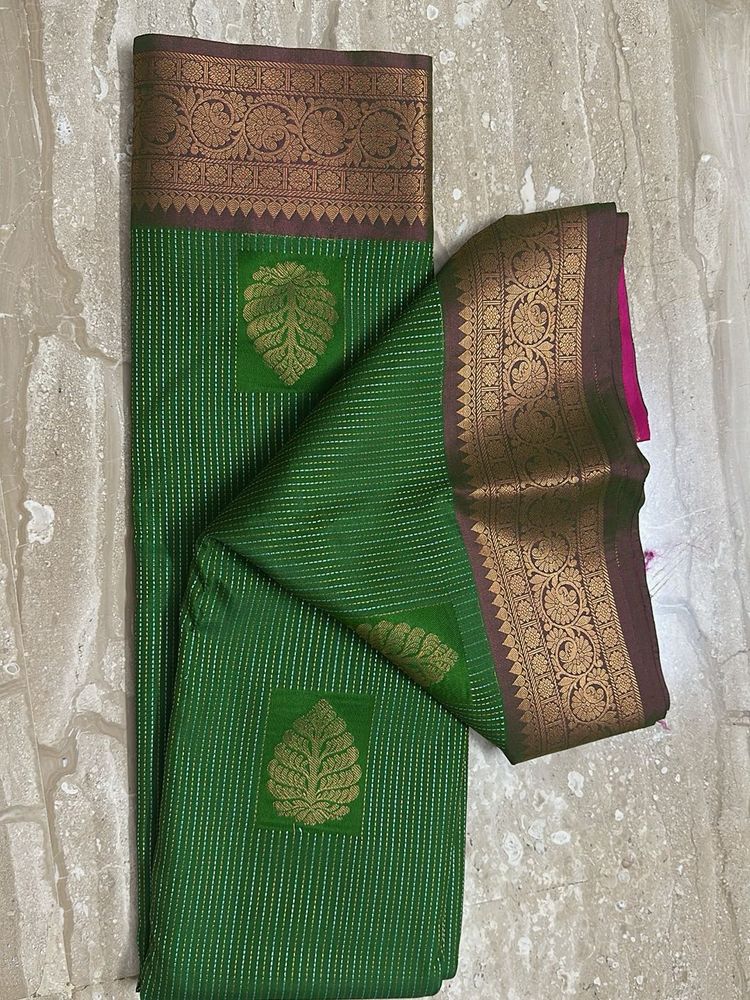 Elegant Green Silk Saree with Gold Border