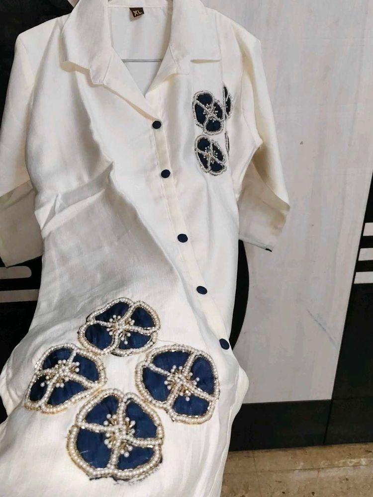 Elegant White Kurta with Blue Embellishments