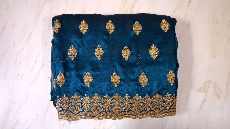 Elegant Teal Saree with Gold Embroidery