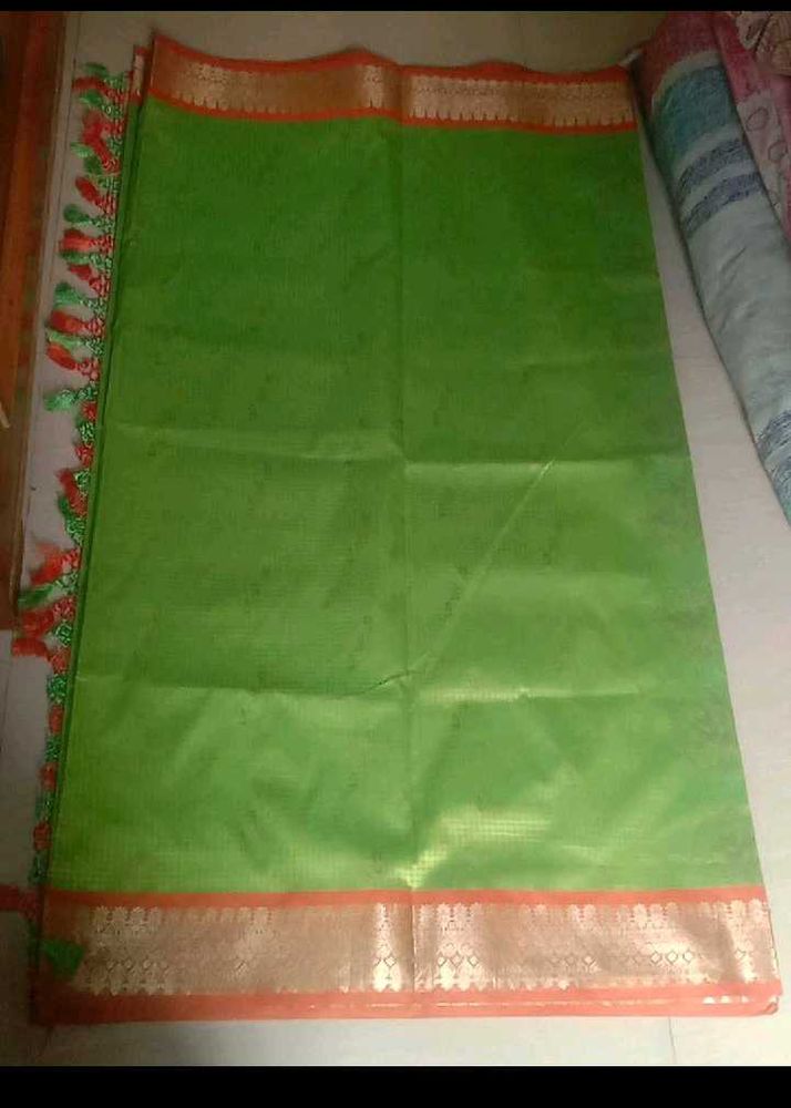 Vibrant Green Saree with Golden Border