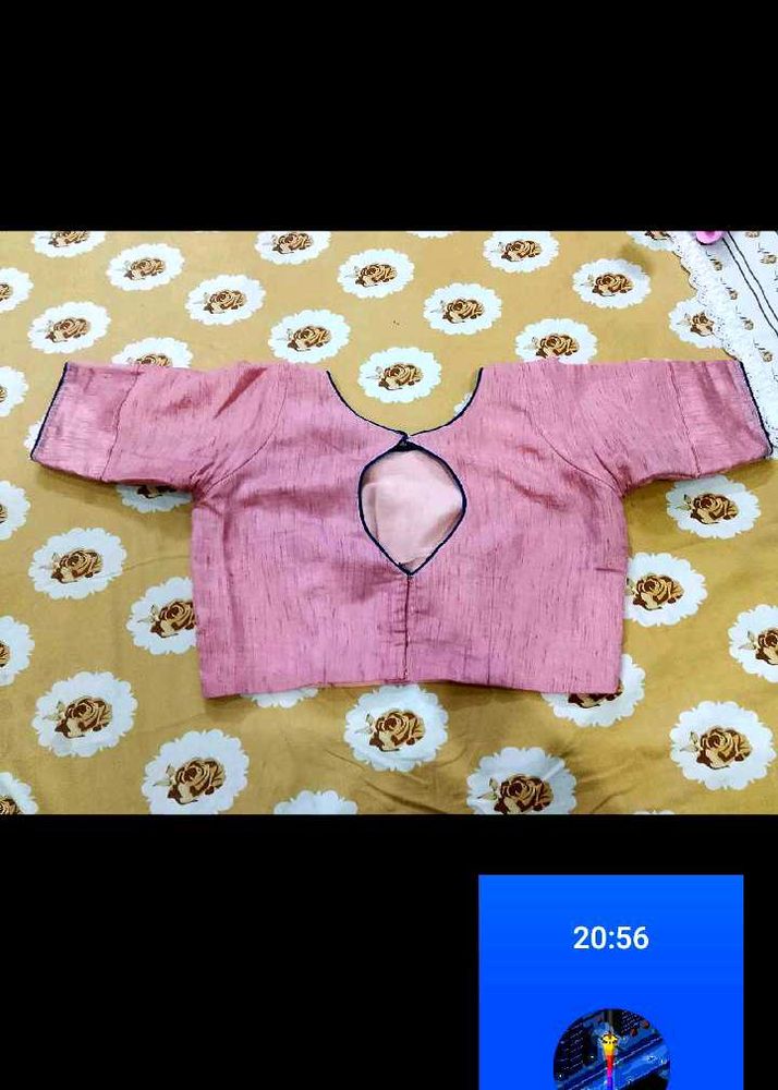 Elegant Pink Blouse with Unique Neckline