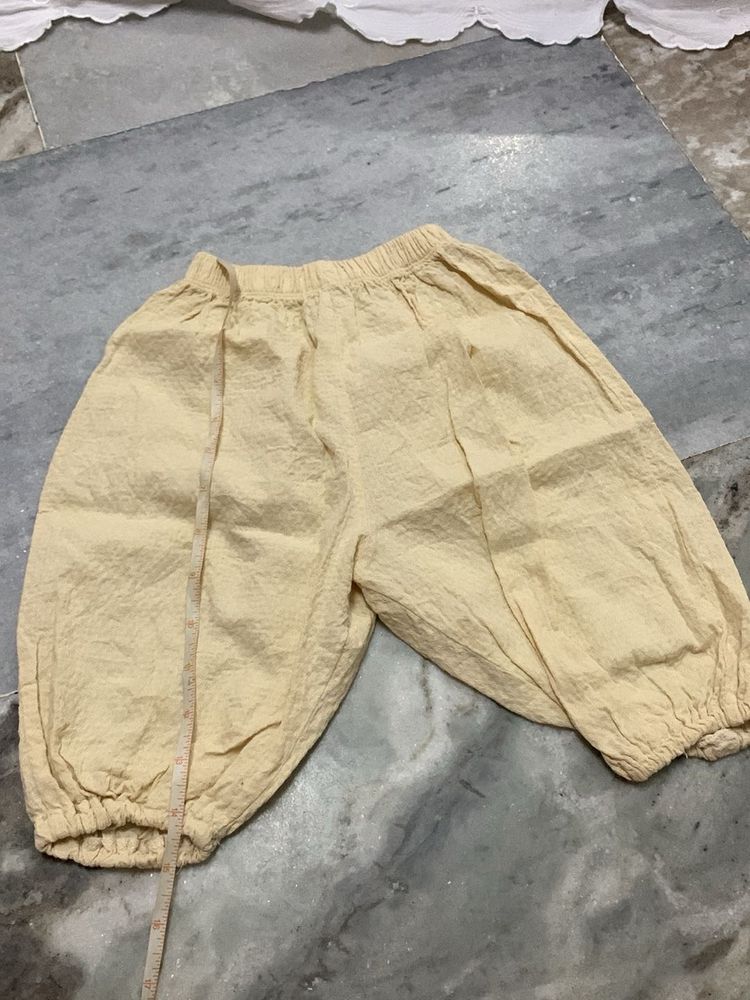 Cream Textured Palazzo Pants