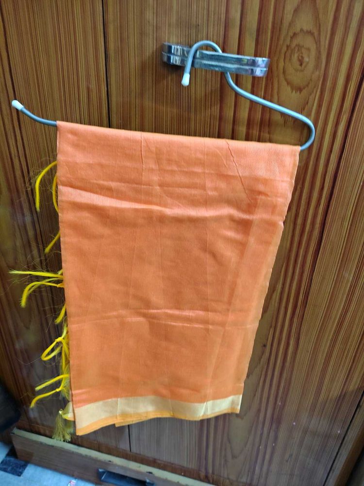 Orange Saree with Yellow Tassels
