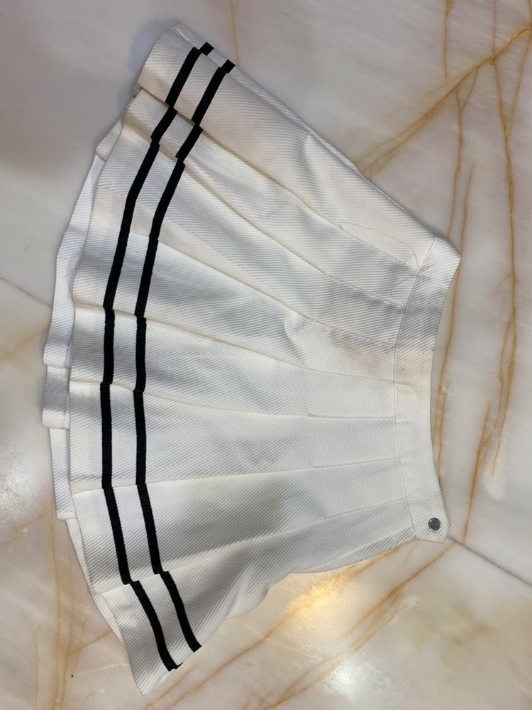 White Pleated Mini Skirt with Black Stripes