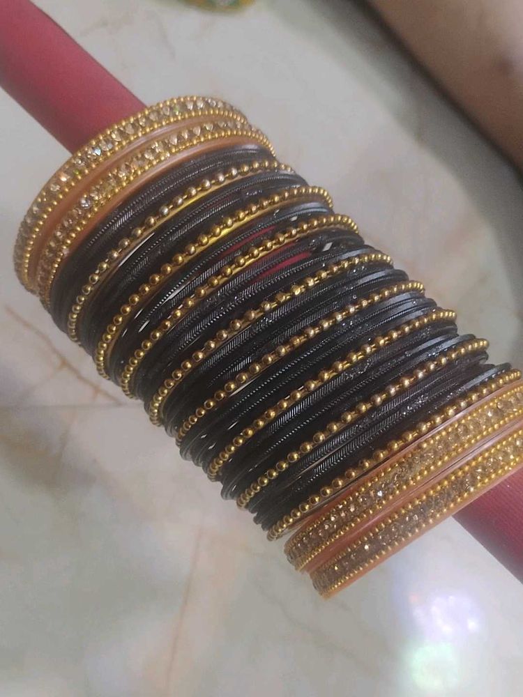 Elegant Black and Gold Bangles