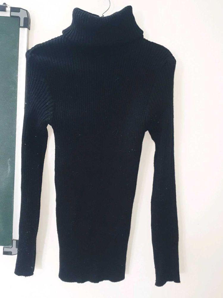 Classic Black Ribbed Turtleneck Sweater