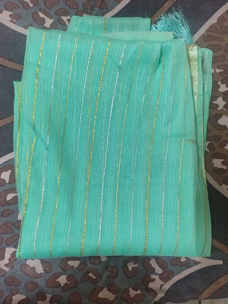 Elegant Teal Saree with Gold Stripes