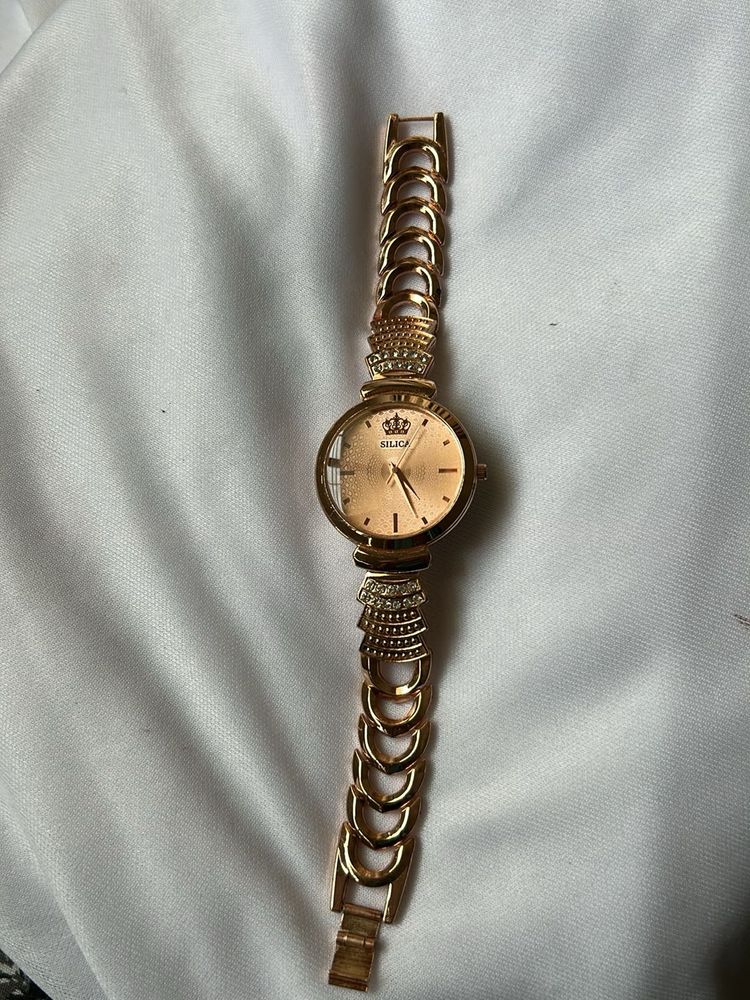 Elegant Rose Gold Watch with Crown Detail