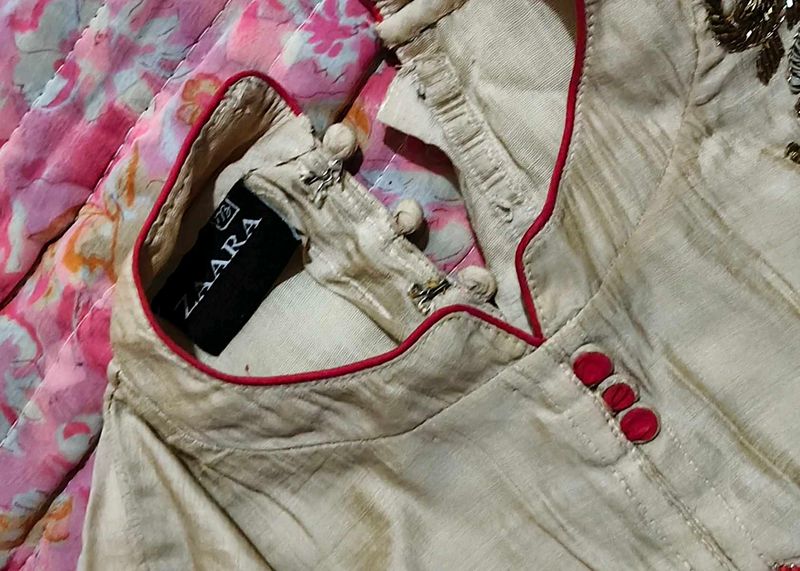 Elegant Beige Kurta with Red Accents