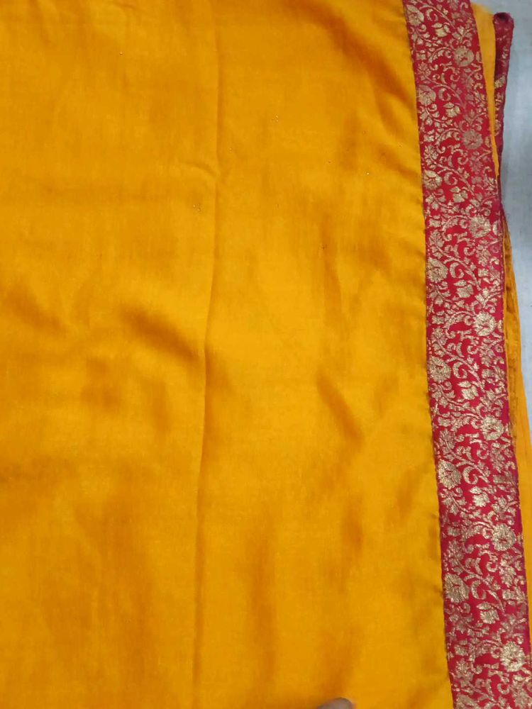 Vibrant Yellow Saree with Red Border