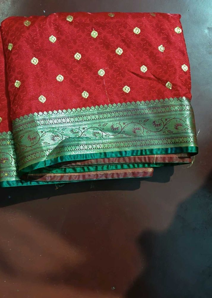 Elegant Red Saree with Gold Motifs