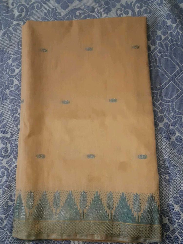 Elegant Peach Saree with Silver Border