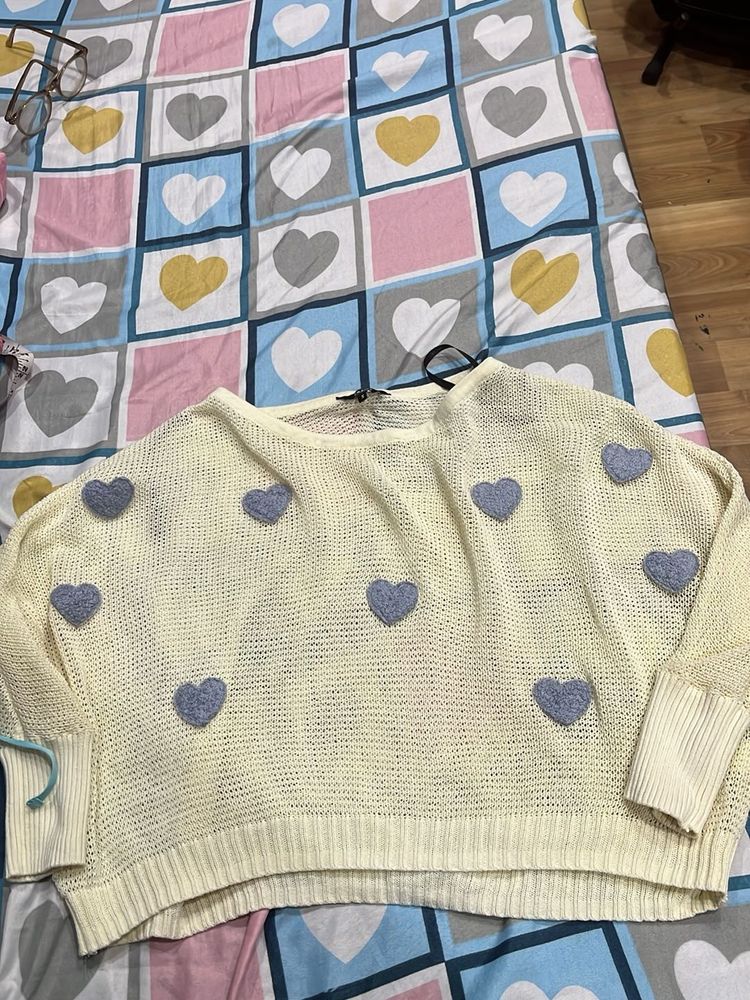 cream sweater