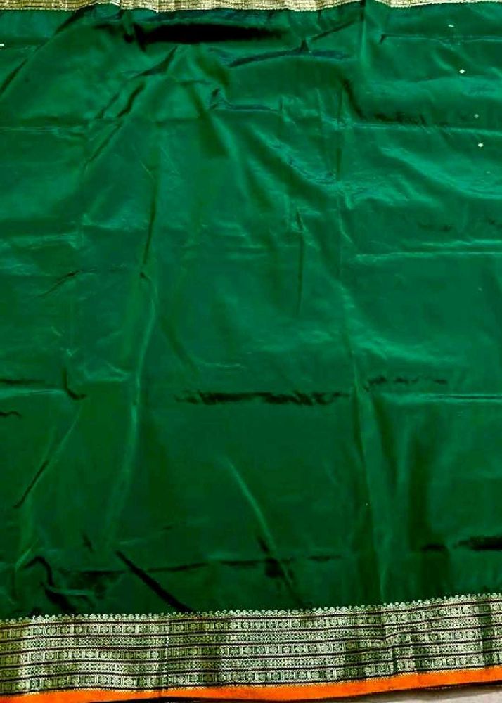 Dark green pure silk saree