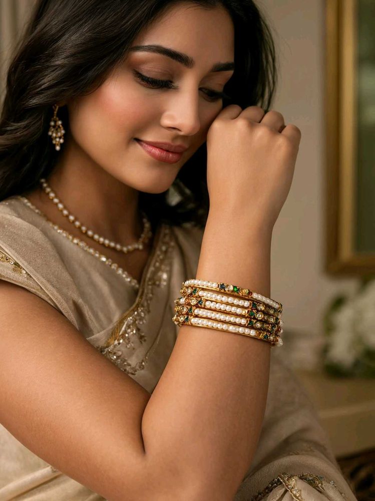 Elegant Gold Tone Bangles with Pearl Accents