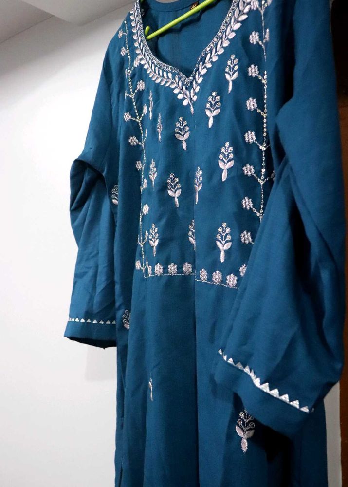 Elegant Embroidered Kurta set.