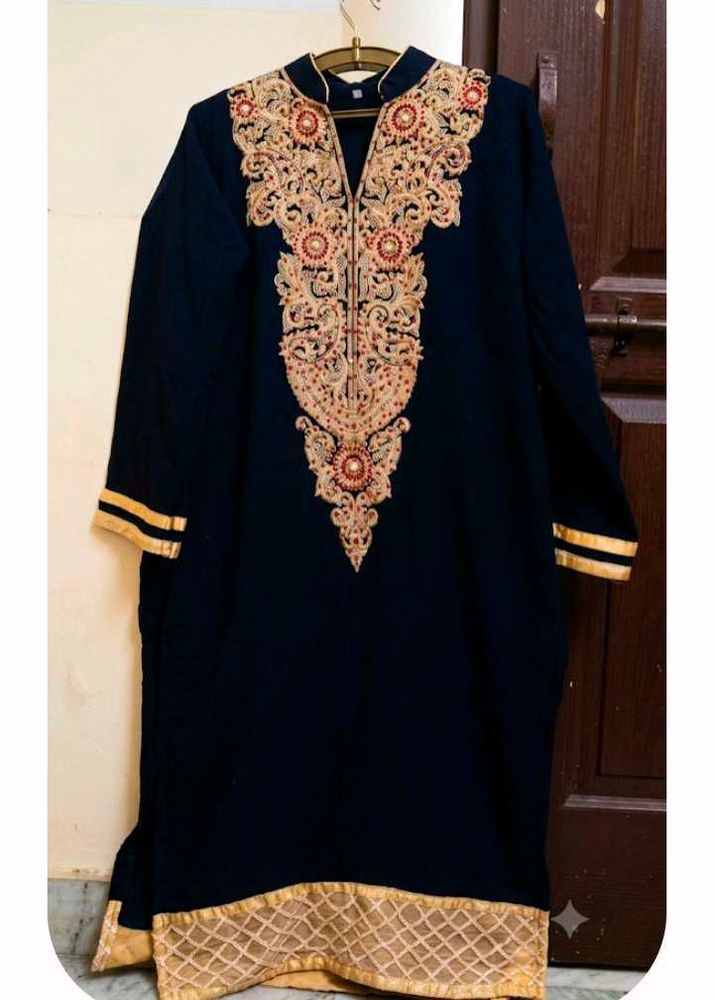 golden and red embroidery black kurti