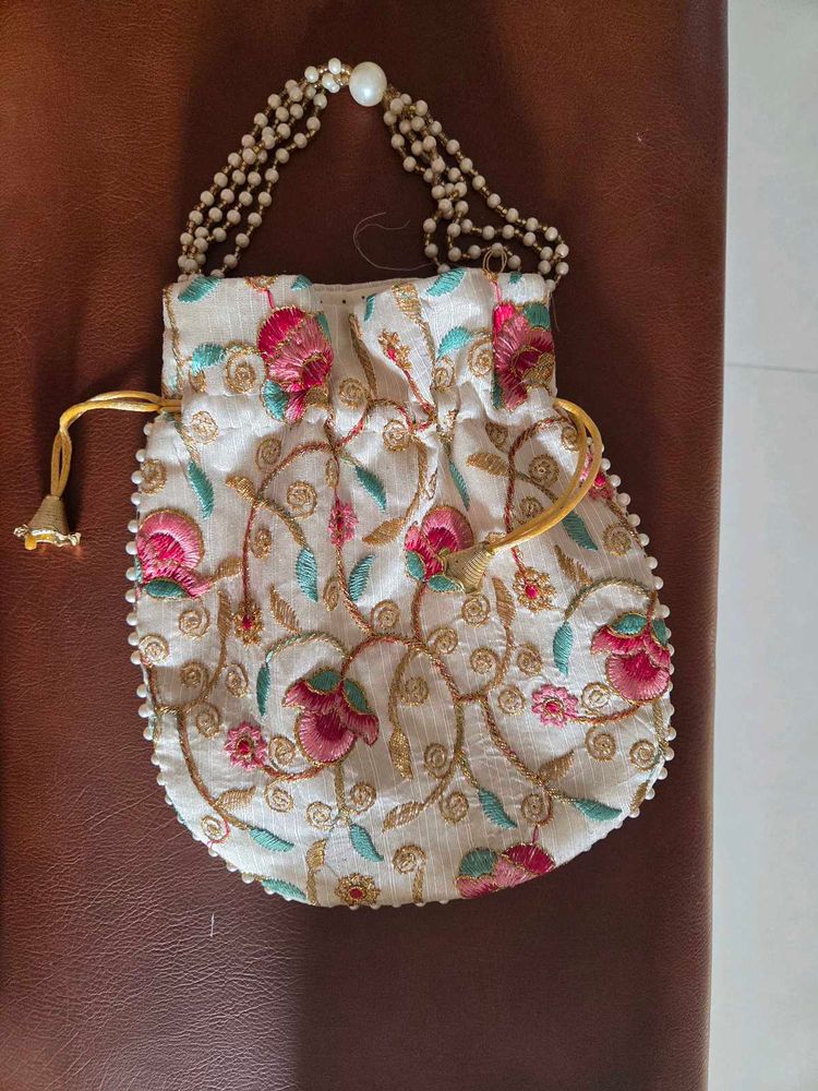 Embroidered Clutch with Pearl Handle