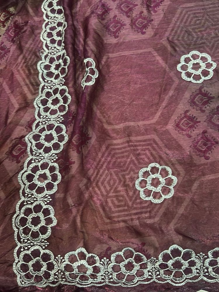 Elegant Maroon Embroidered Saree
