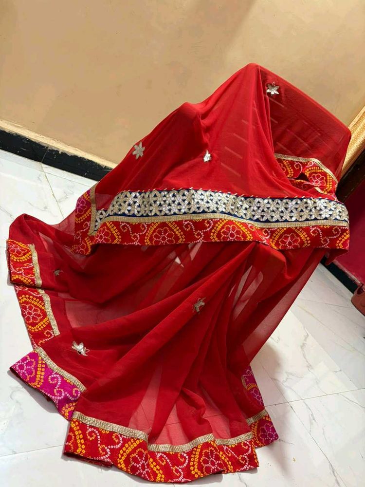 Red Embroidered saree with Mirror Work