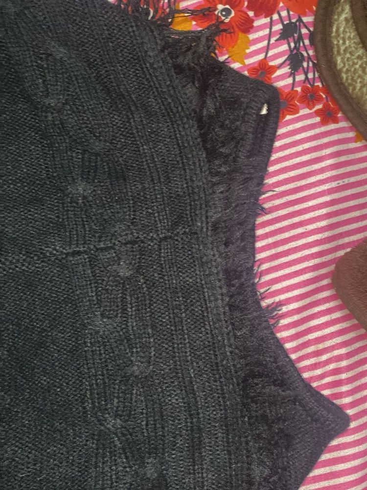 Cozy Knit Sweater with Fringe