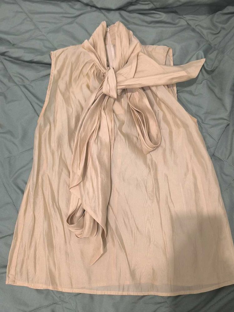 Elegant Beige Sleeveless Top with Bow