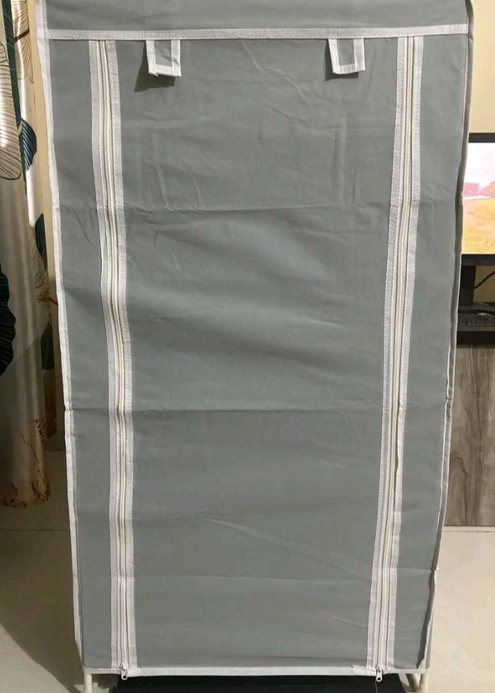 Grey Fabric Wardrobe with vast iron base