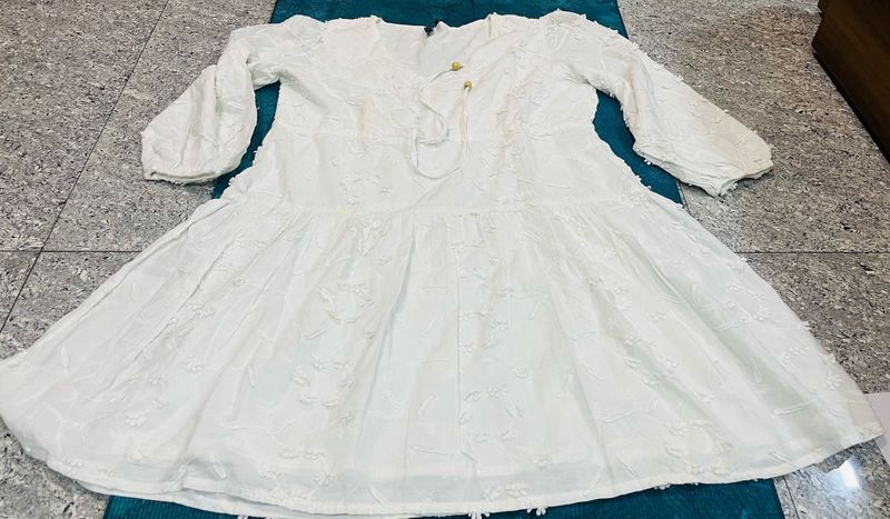 Elegant White dress with Intricate Detailing