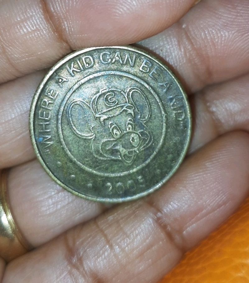 Rare Coin United States (USA) Arcade Token - Chuck E Cheese with letter "C" on the hat 2005 Where A Kid Can Be A Kid
