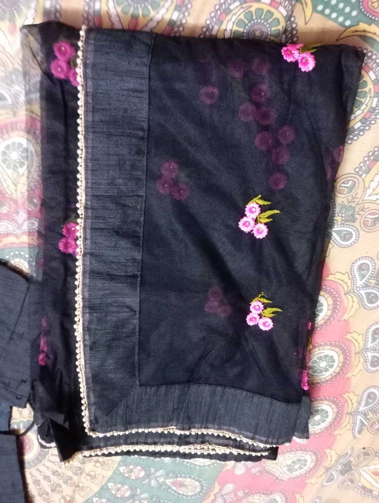 Elegant Black Saree with Pink Floral Embroidery