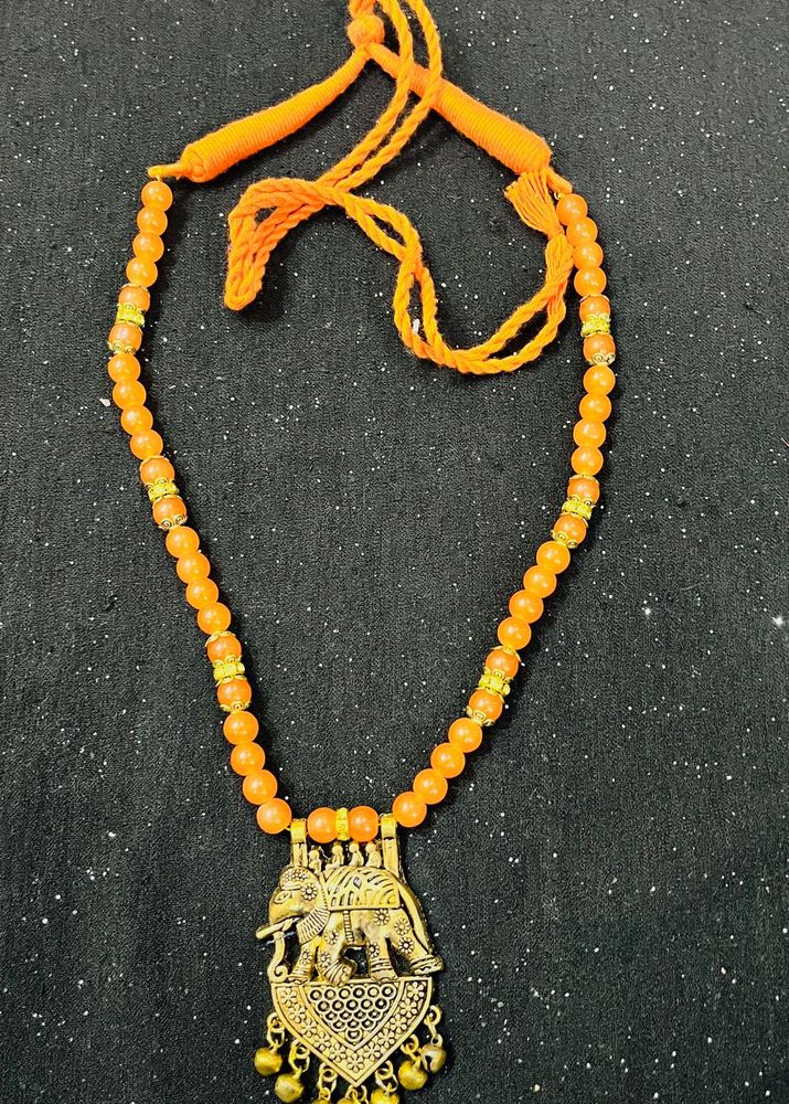 Orange Beaded Necklace with Elephant Pendant