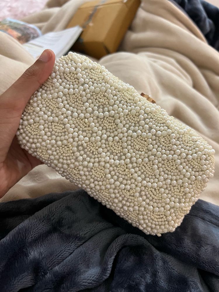 white pearl clutch