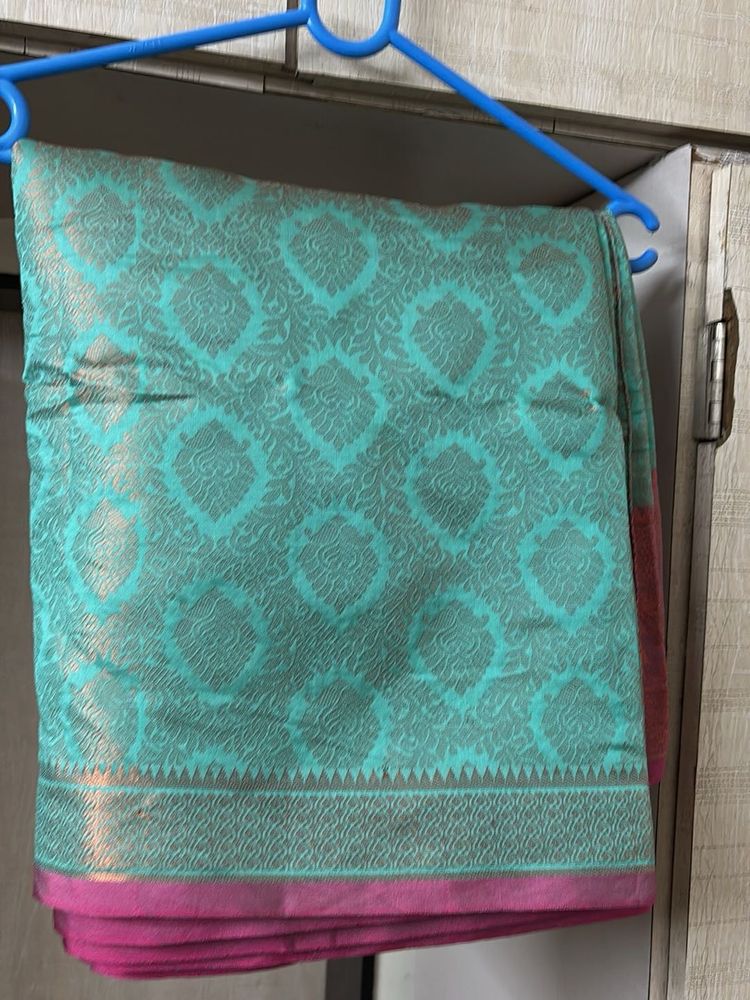 Elegant Teal &amp; Pink Patterned Saree