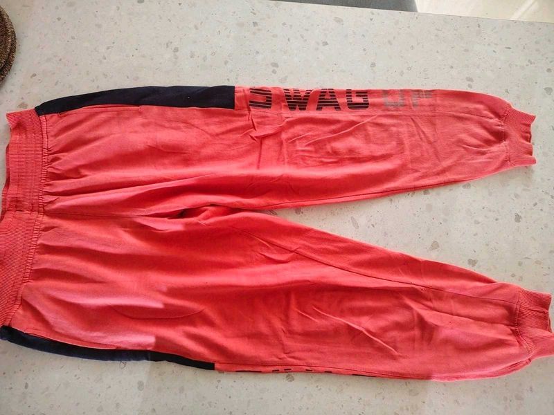 Stylish Coral Joggers with "SWAG" Print
