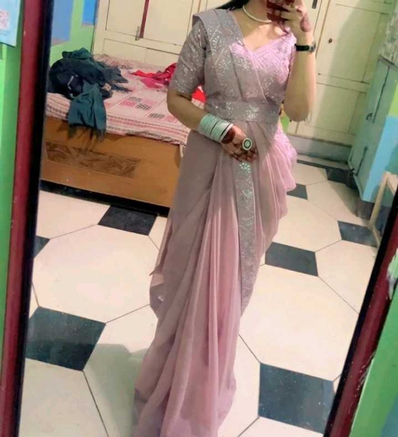 Elegant Pink Saree with Embellished Blouse