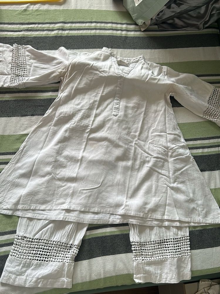 Elegant White Kurta Set with Intricate Detailing