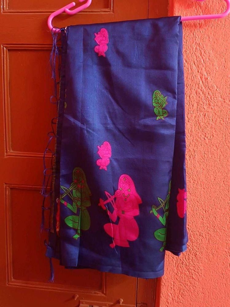 Blue Saree with Vibrant Figures