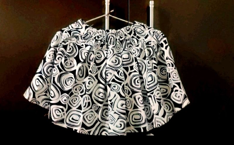 Black &amp; White Patterned Mini Skirt With Short