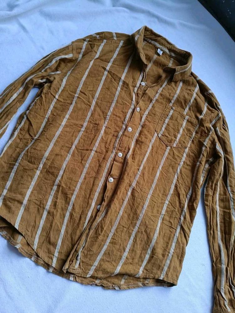Men's brown lined button up shirt